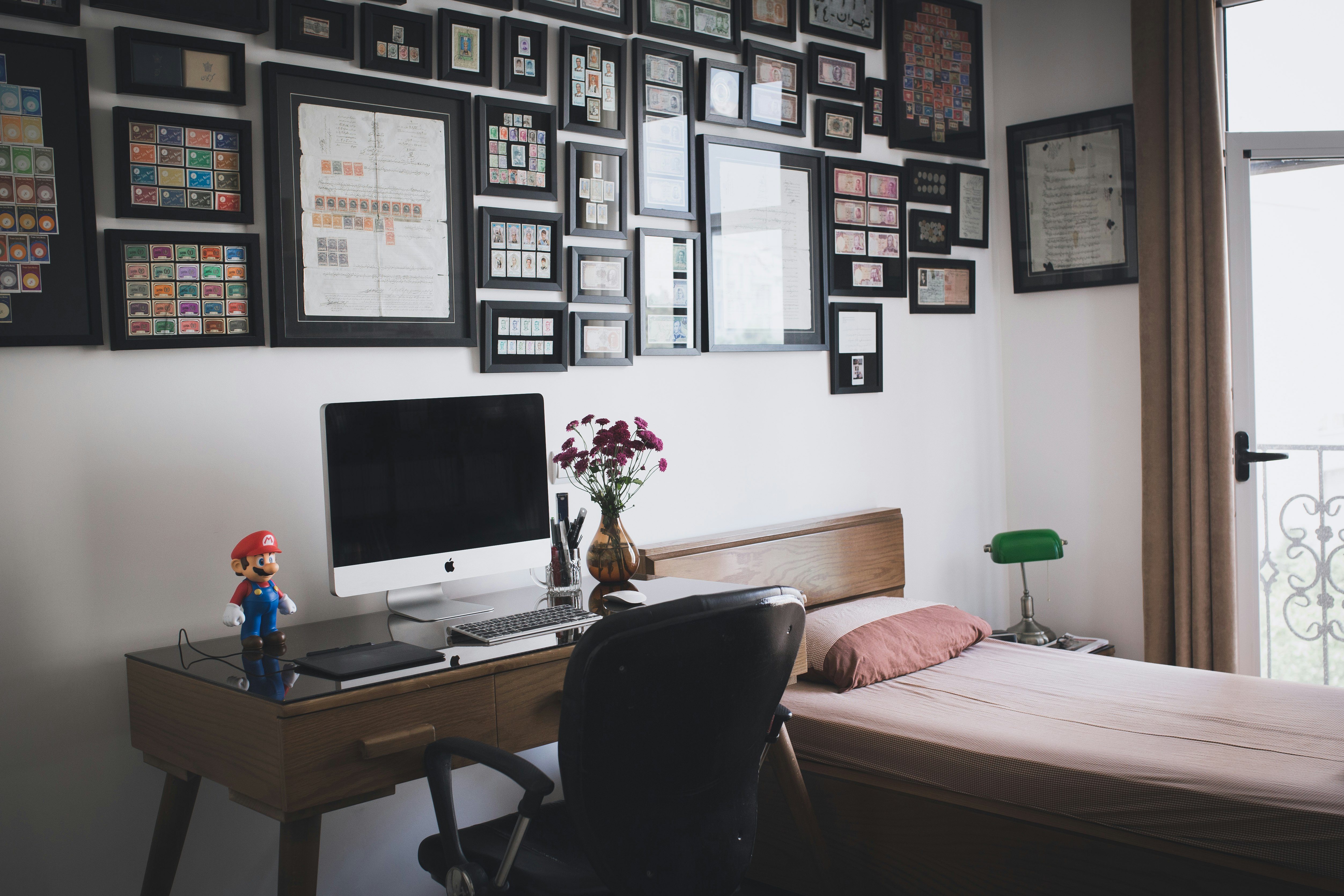 silver imac on white wooden desk